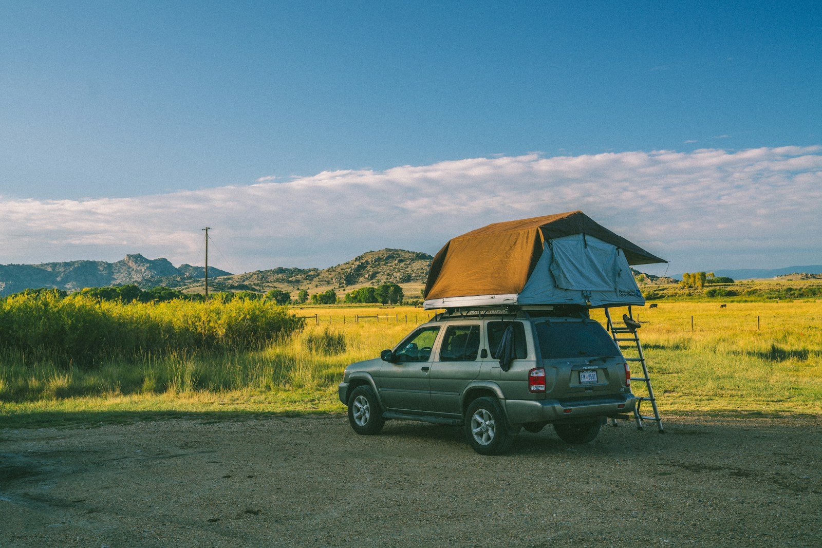 A roof tent mounted on a vehicle